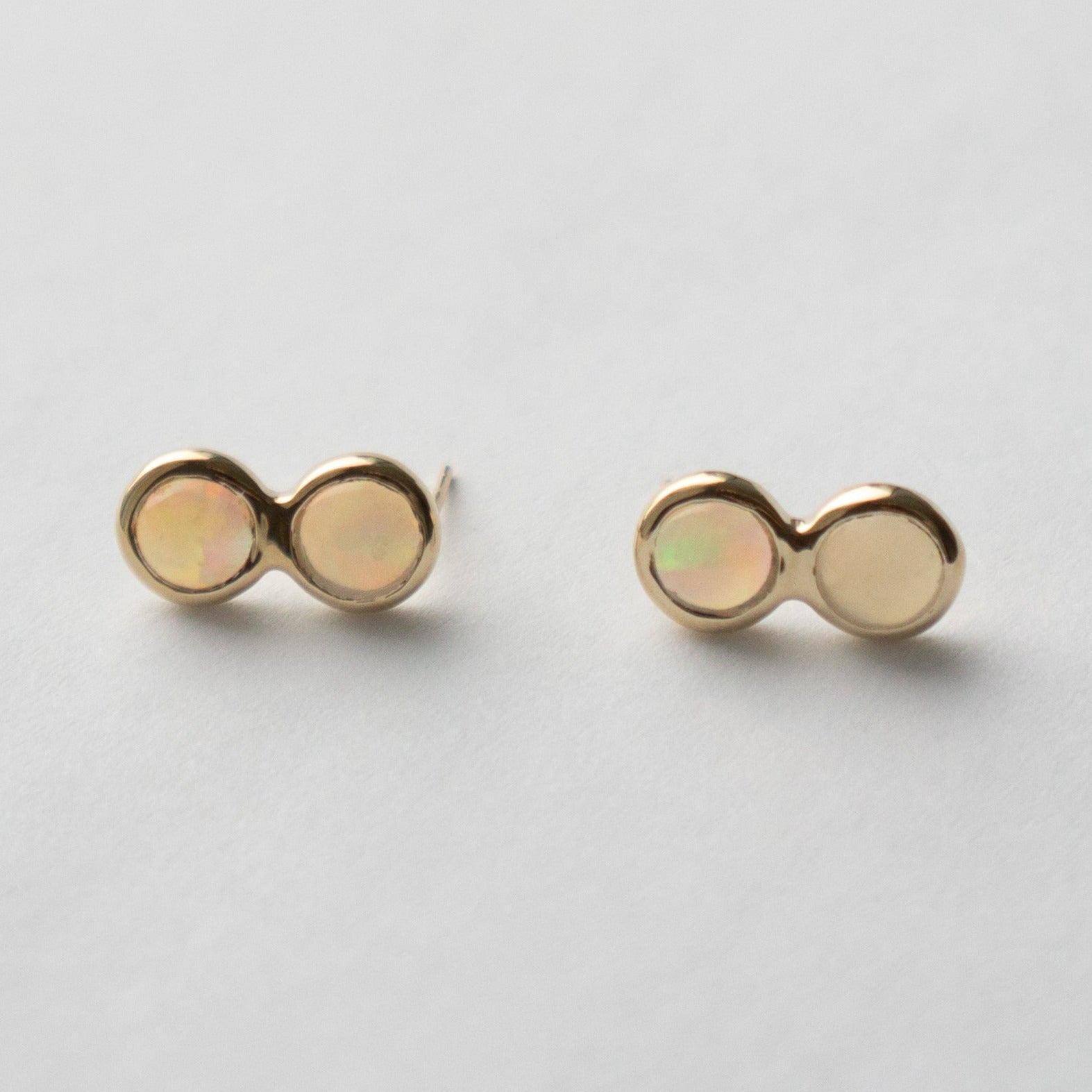 Handmade Alia stud earrings in 14 karat yellow gold set with opal made in New York City by SHW fine Jewelry