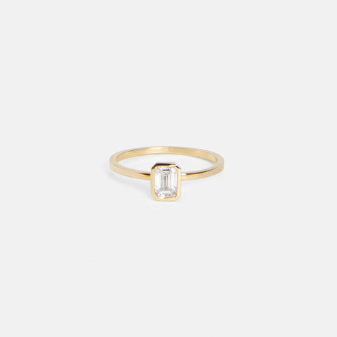 Auda Alternative Ring in 14k Gold set with an emerald cut natural diamond By SHW Fine Jewelry New York City