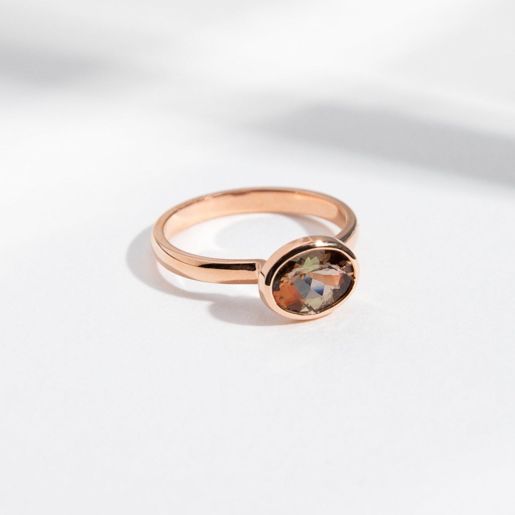 Simple Domed Band Bezel engagement ring with East West Facing Unique Color Gem in 14 karat rose gold by SHW fine jewelry downtown NYC SoHo