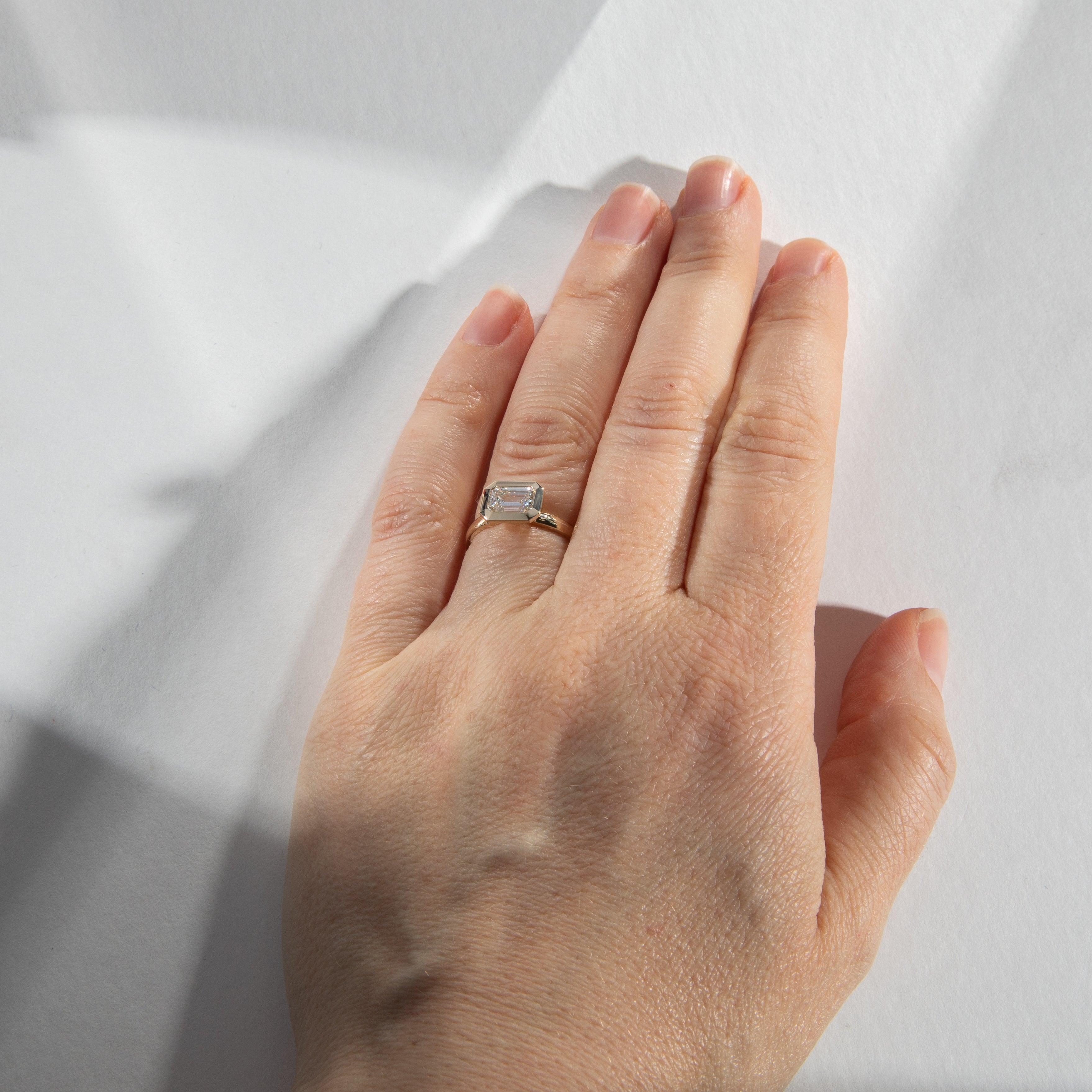 Modern Domed Stackable Band Engagement Ring with one carat lab emerald-cut diamond in 14k yellow gold by SHW best fine jewelry stores NYC