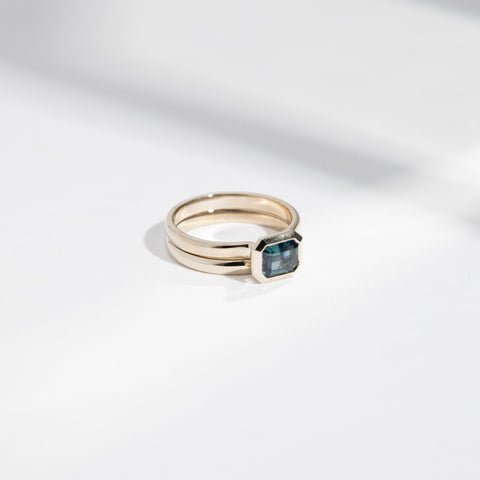 Vilke Cool Ring in 14k White Gold set with a 0.91ct emerald cut teal sapphire By SHW Fine Jewelry NYC