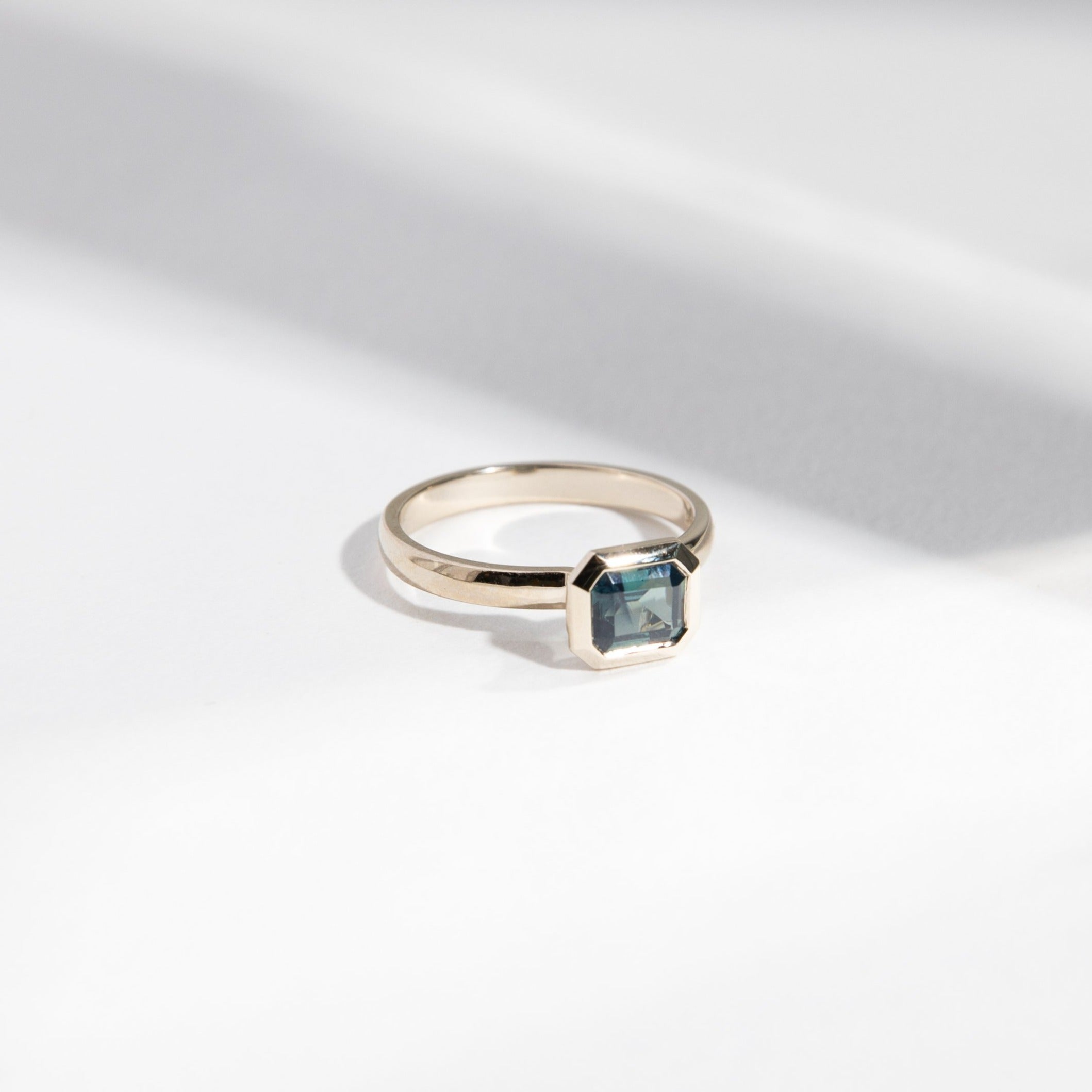 Vilke Unique Ring in 14k White Gold set with a 0.91ct emerald cut teal sapphire By SHW Fine Jewelry NYC
