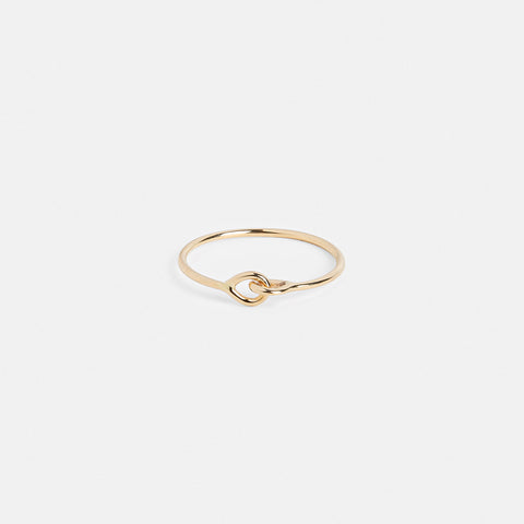 14k yellow gold thin round profile ring with connecting design